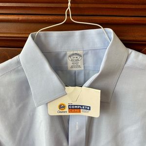 Brooks Brother’s blue, Supima cotton, spread collar, long sleeve dress shirt.